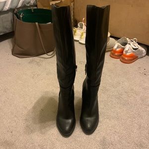 Black like new knee high boots